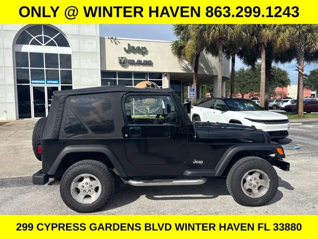 Used 2004 Black Jeep X image 2