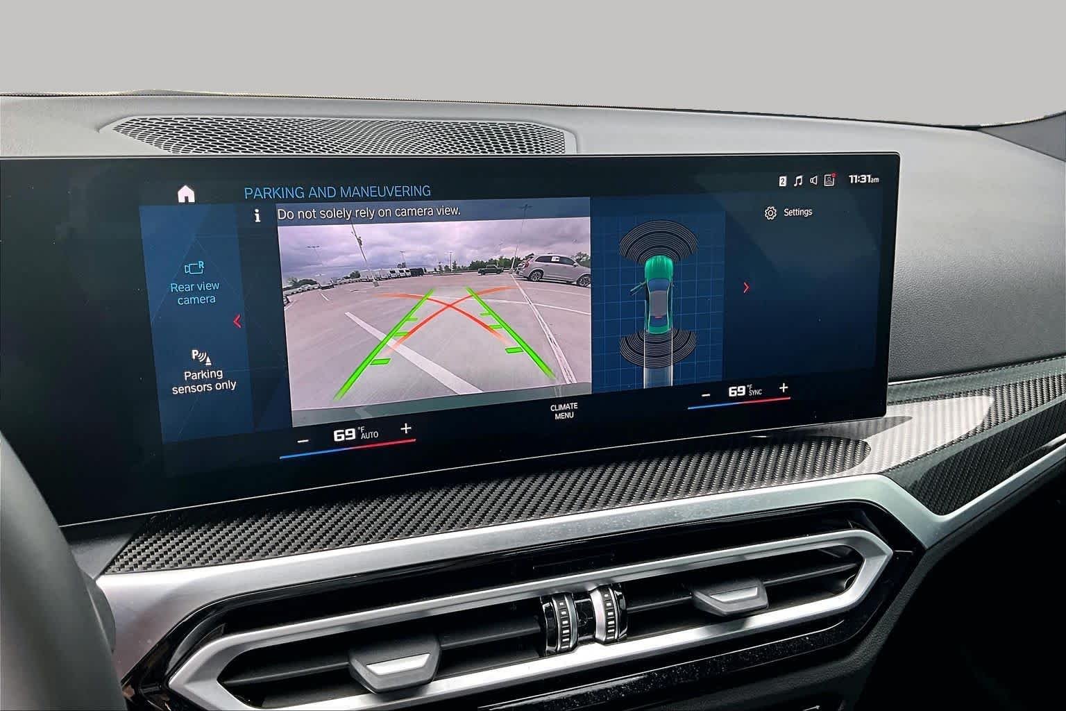 Used 2024 Isle of Man Green Metallic BMW Competition image 23