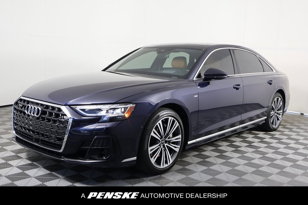 Used 2023 Blue Metallic Audi L 55 image 1