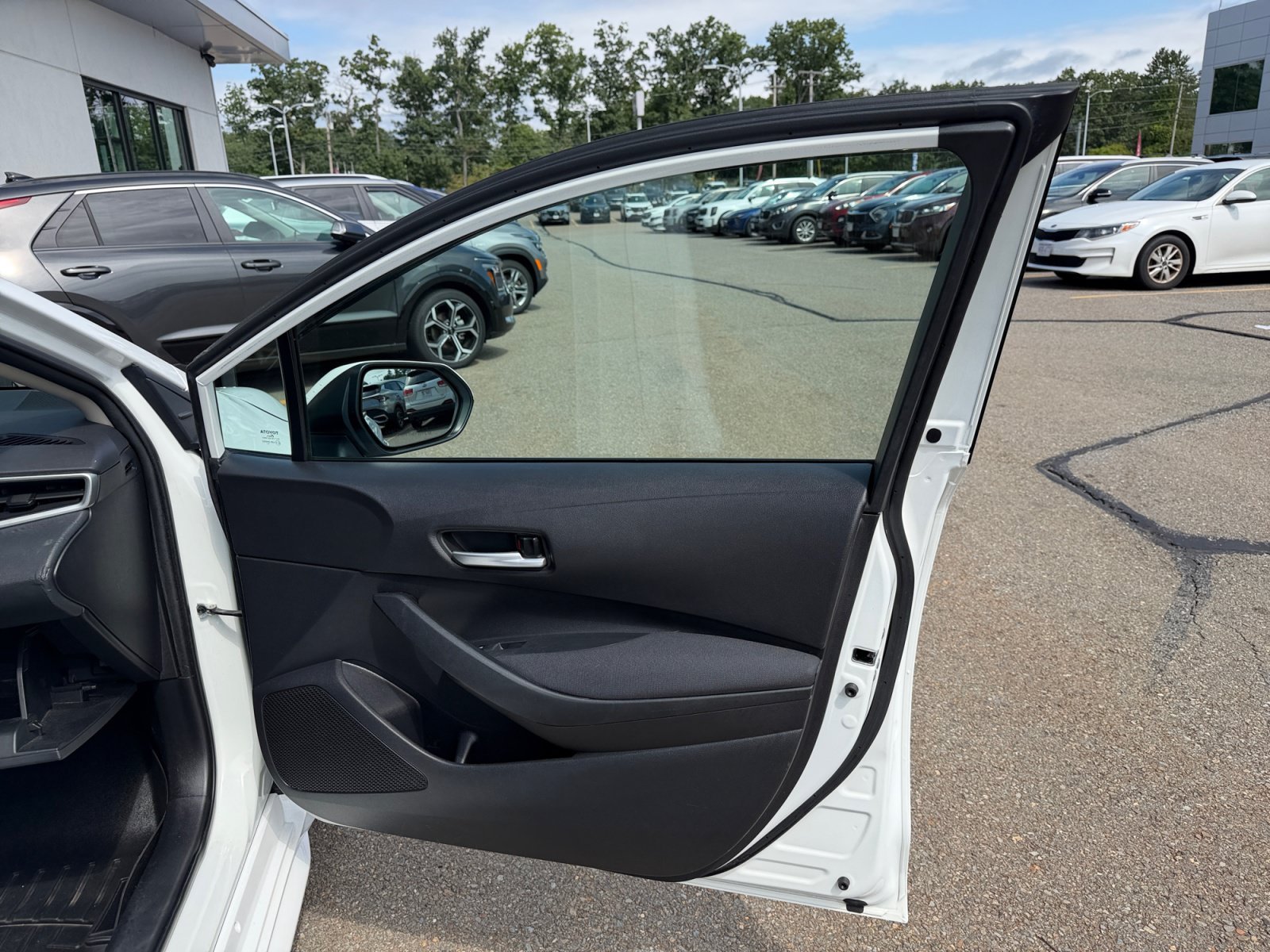 Used 2020 Super White Toyota LE image 28