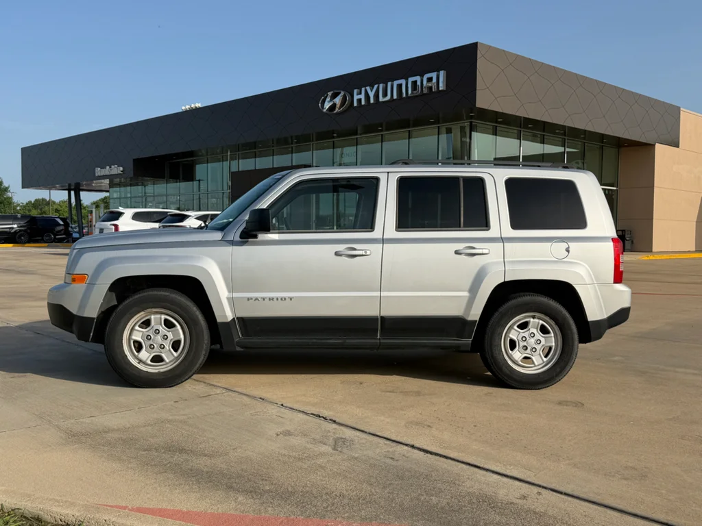 Used 2011 Bright Silver Metallic Clearcoat Jeep Sport image 2