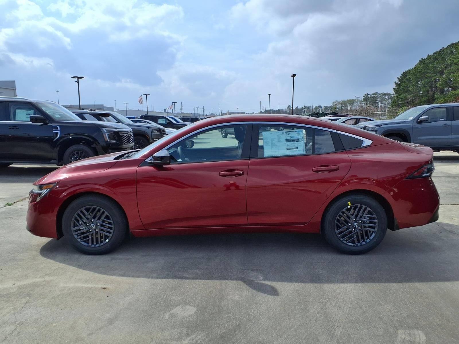 2026 Nissan Sentra SV Red at Robbins Nissan