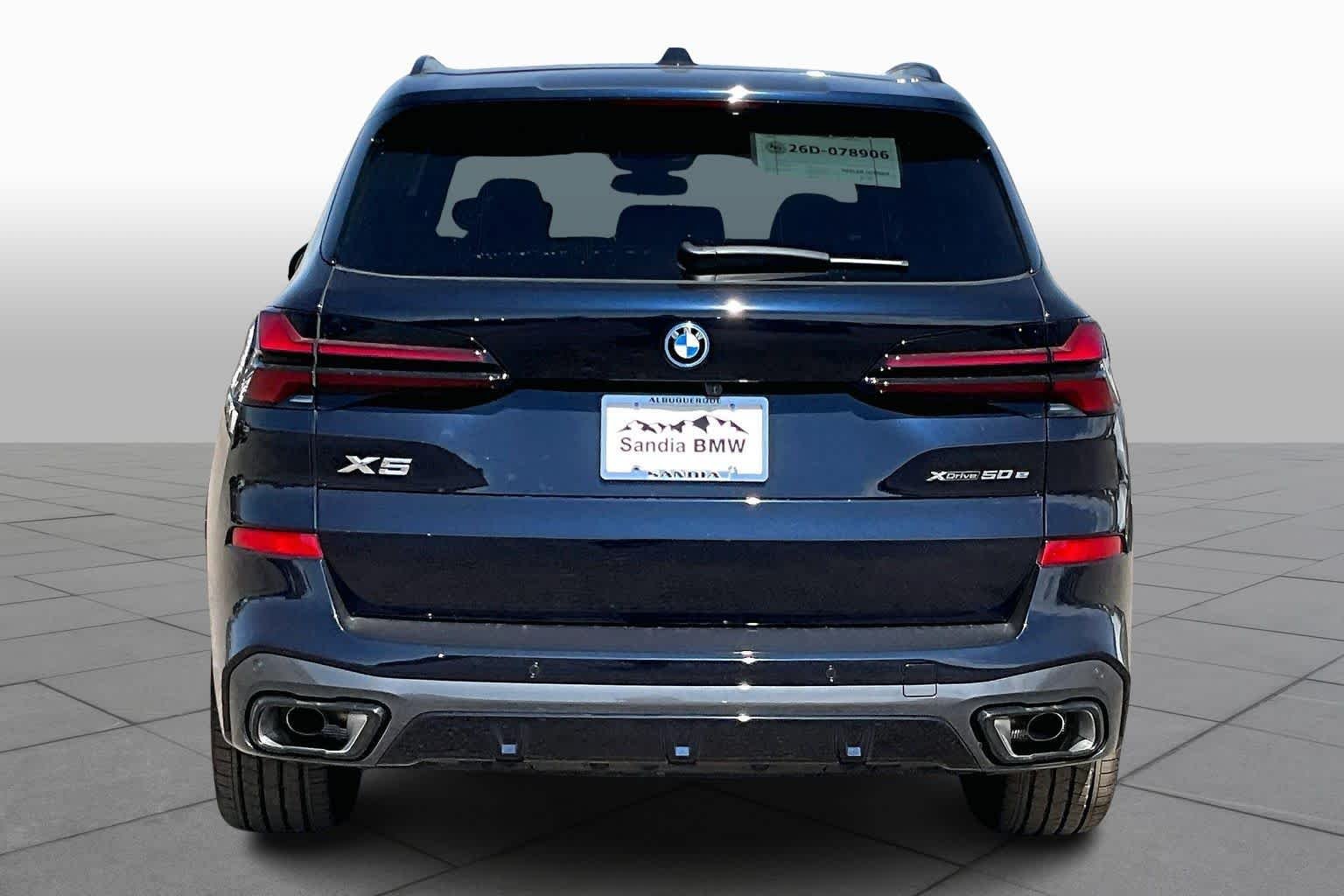 New 2026 Carbon Black Metallic BMW xDrive50e image 4