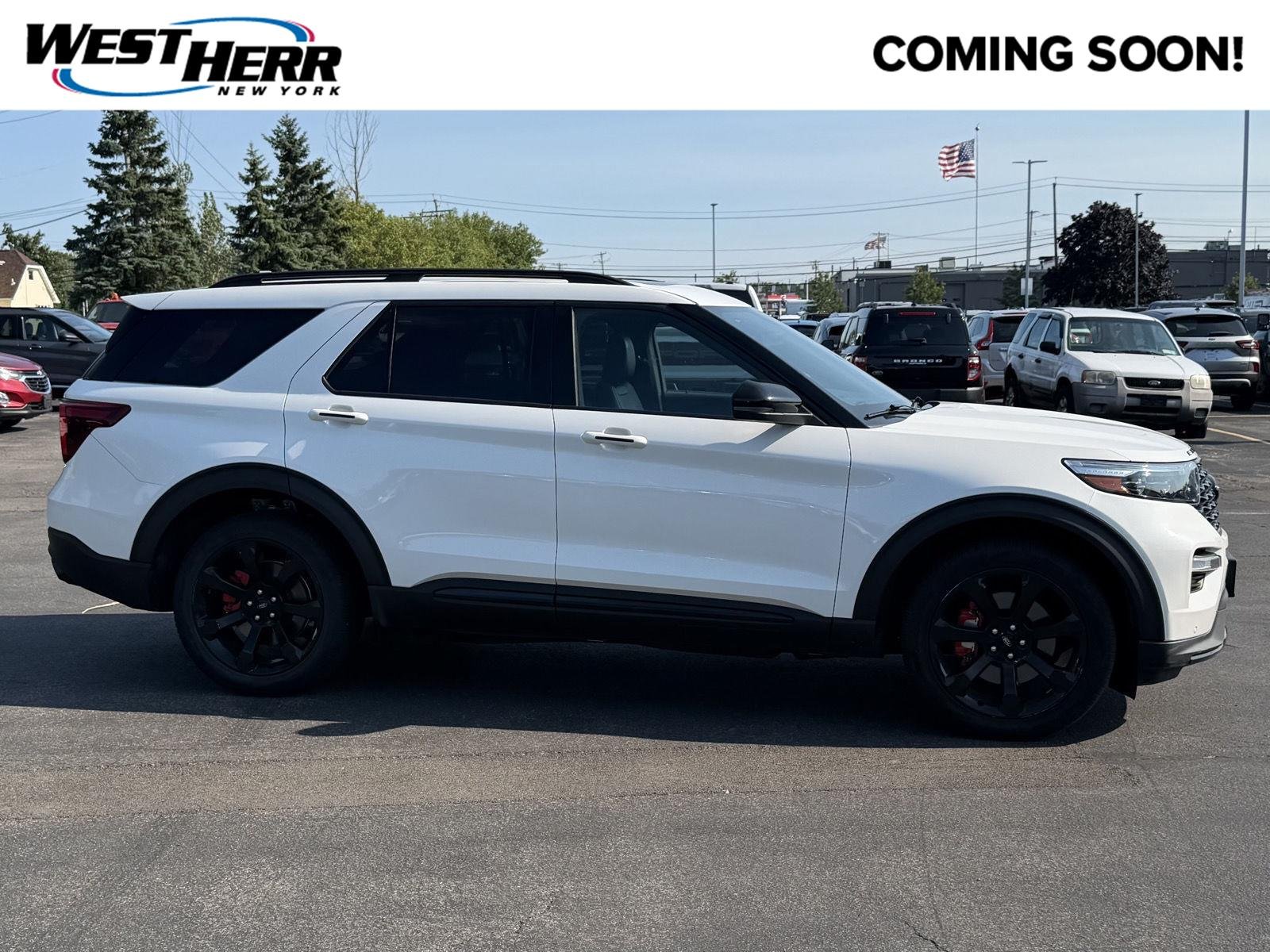 Used 2023 Star White Metallic Tri-Coat Ford ST image 1
