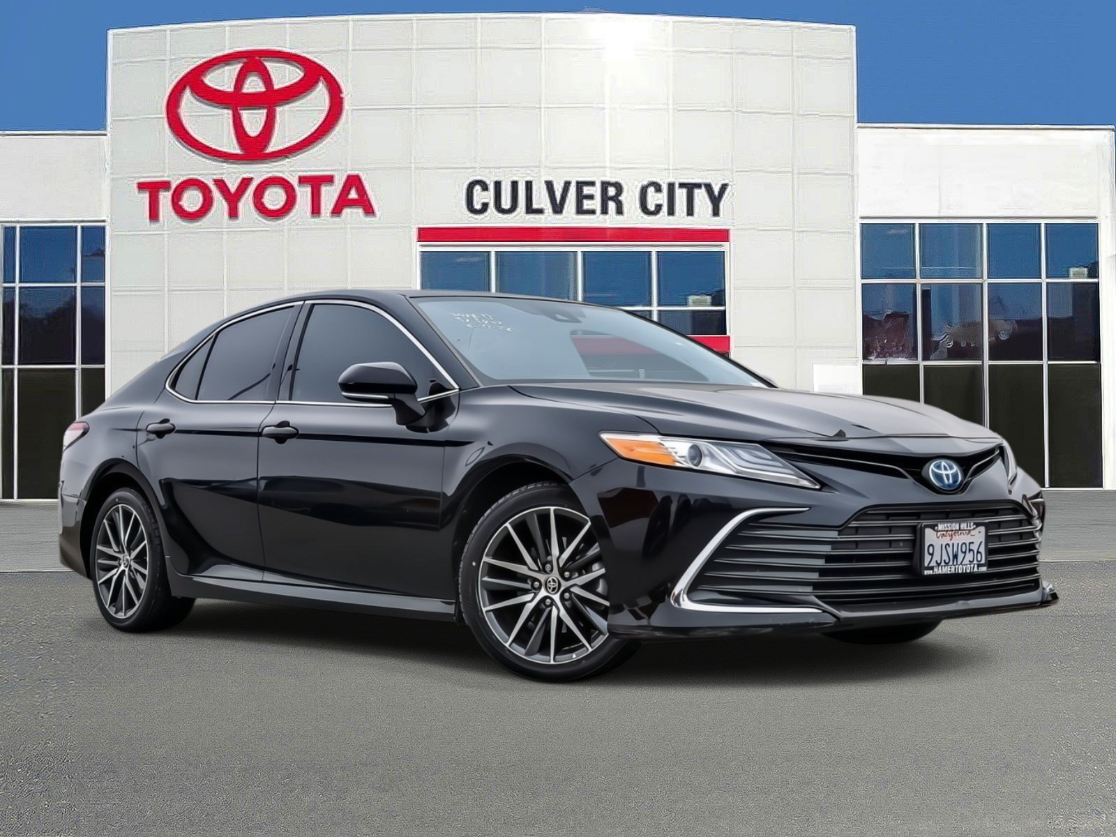 Used 2024 Midnight Black Metallic Toyota Hybrid XLE image 1