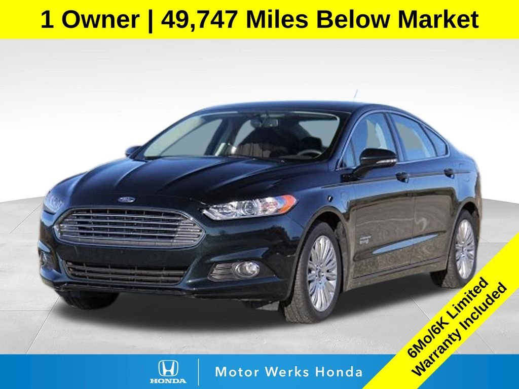 Used 2014 Tuxedo Black Metallic Ford SE image 1