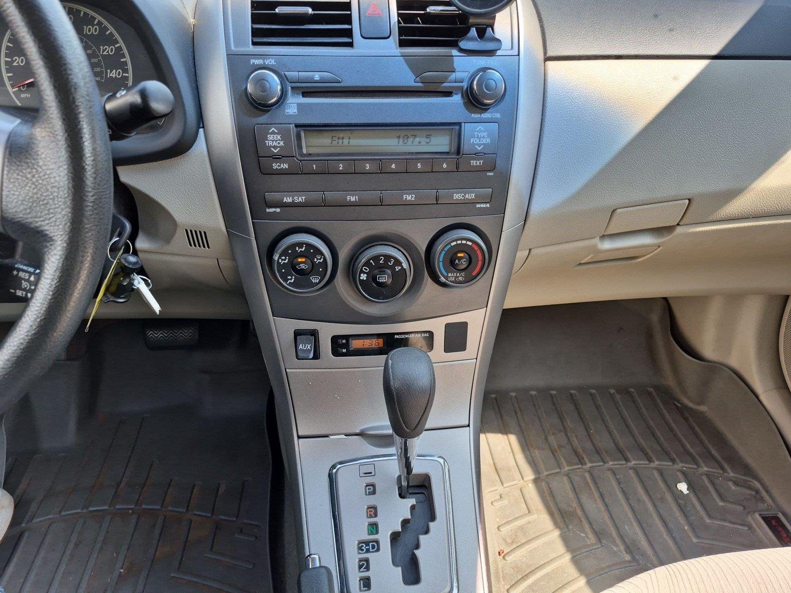 Used 2011 Barcelona Red Metallic Toyota LE image 23