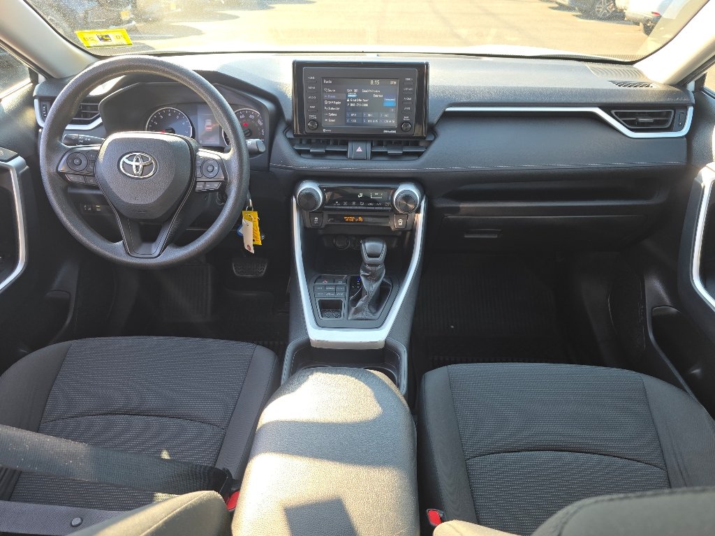 Used 2021 Super White Toyota LE image 2