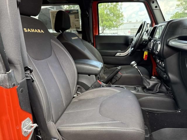 Used 2015 Orange Jeep Sahara image 15