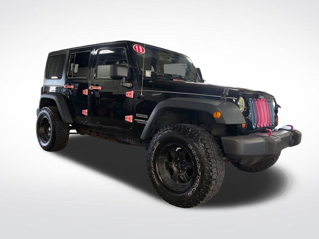 Used 2013 Black Jeep Unlimited Sport image 8