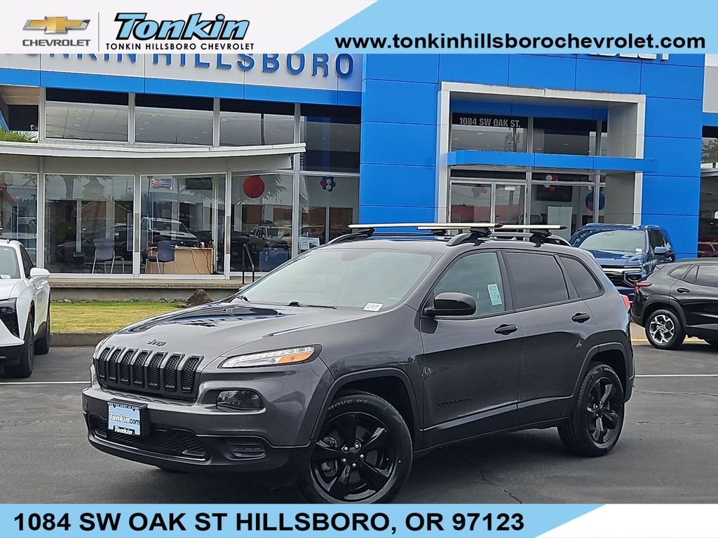 Used 2016 Granite Crystal Metallic Clearcoat Jeep Sport image 1