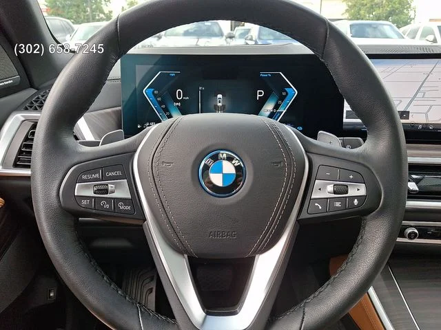 Certified Used 2025 Mineral White Metallic BMW xDrive50e image 19