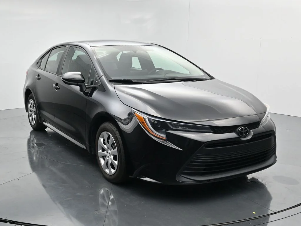 Used 2024 Black Toyota LE image 1