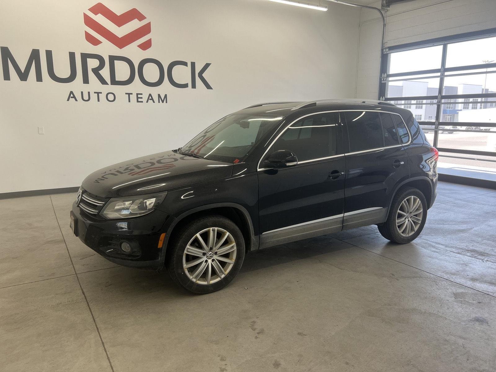 Used 2016 Deep Black Pearl Volkswagen SE image 1