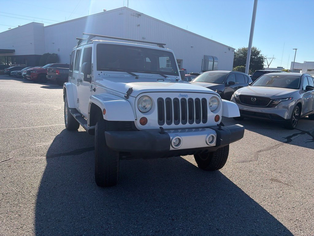 Used 2013 White Jeep Unlimited Sahara image 4