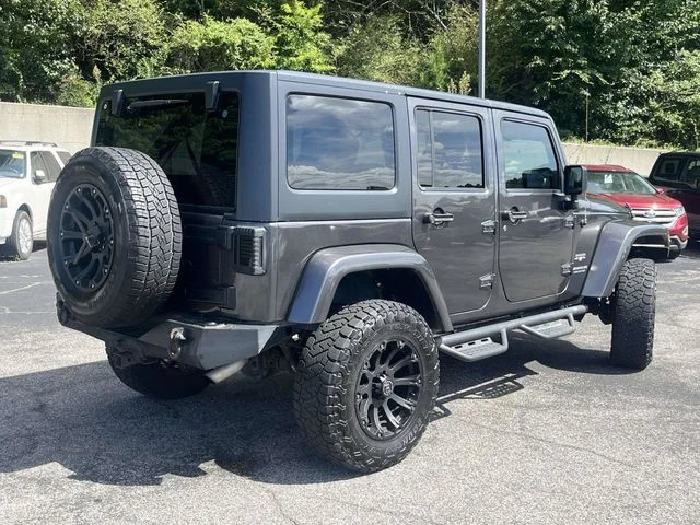 Used 2016 Gray Jeep Unlimited Sahara image 3
