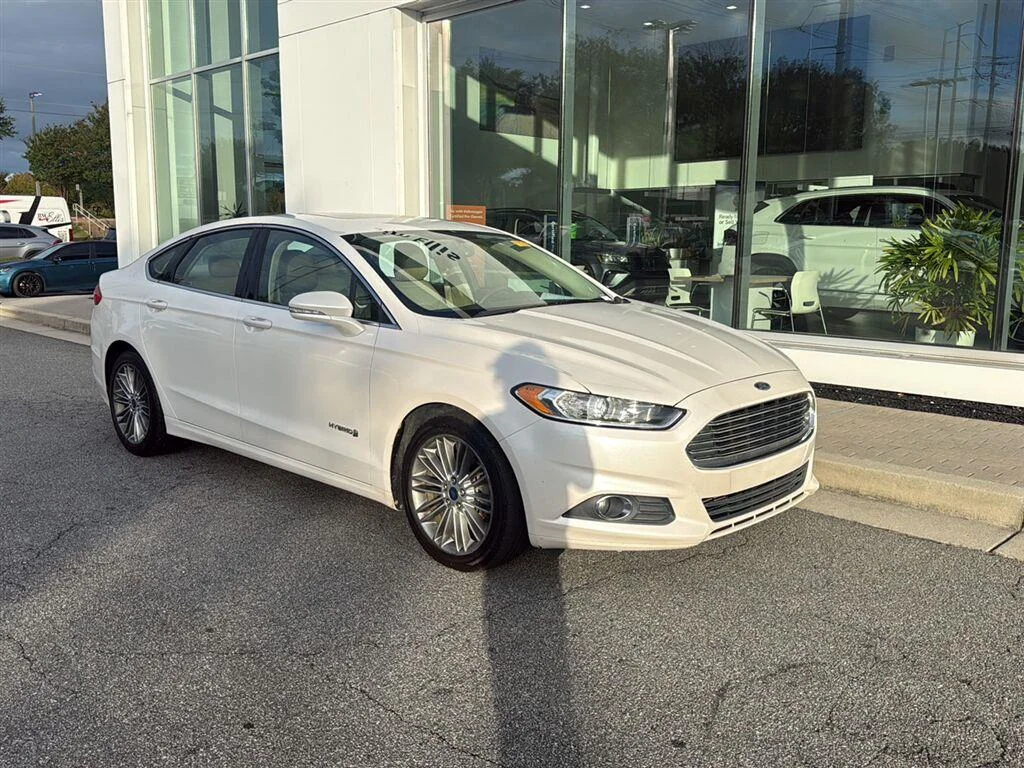 Used 2014 Ford Fusion SE Hybrid with VIN 3FA6P0LUXER173235 for sale in Kennesaw, GA