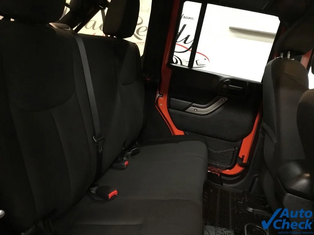 Used 2015 Orange Jeep Unlimited Sport image 33