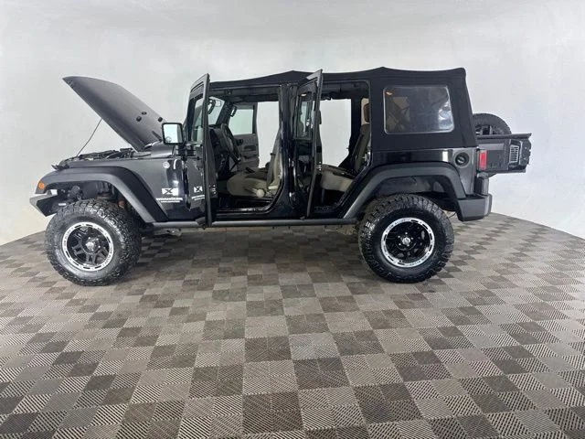 Used 2009 Black Jeep Unlimited X image 11