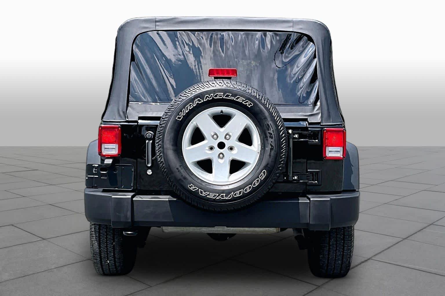 Used 2016 Black Clearcoat Jeep Sport image 5