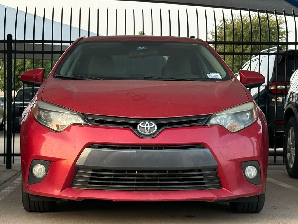 Used 2016 Barcelona Red Metallic Toyota LE Plus image 2