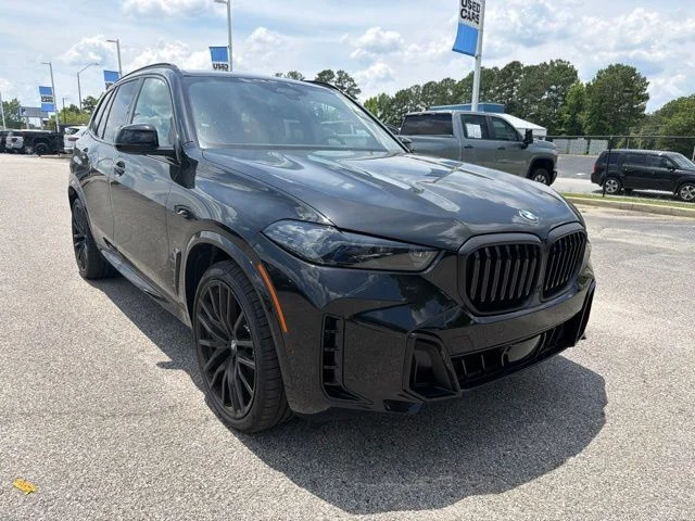 Used 2026 Black BMW xDrive40i image 1