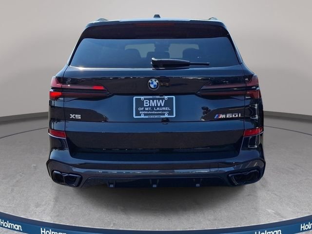 New 2026 Black Sapphire Metallic BMW M60i image 5