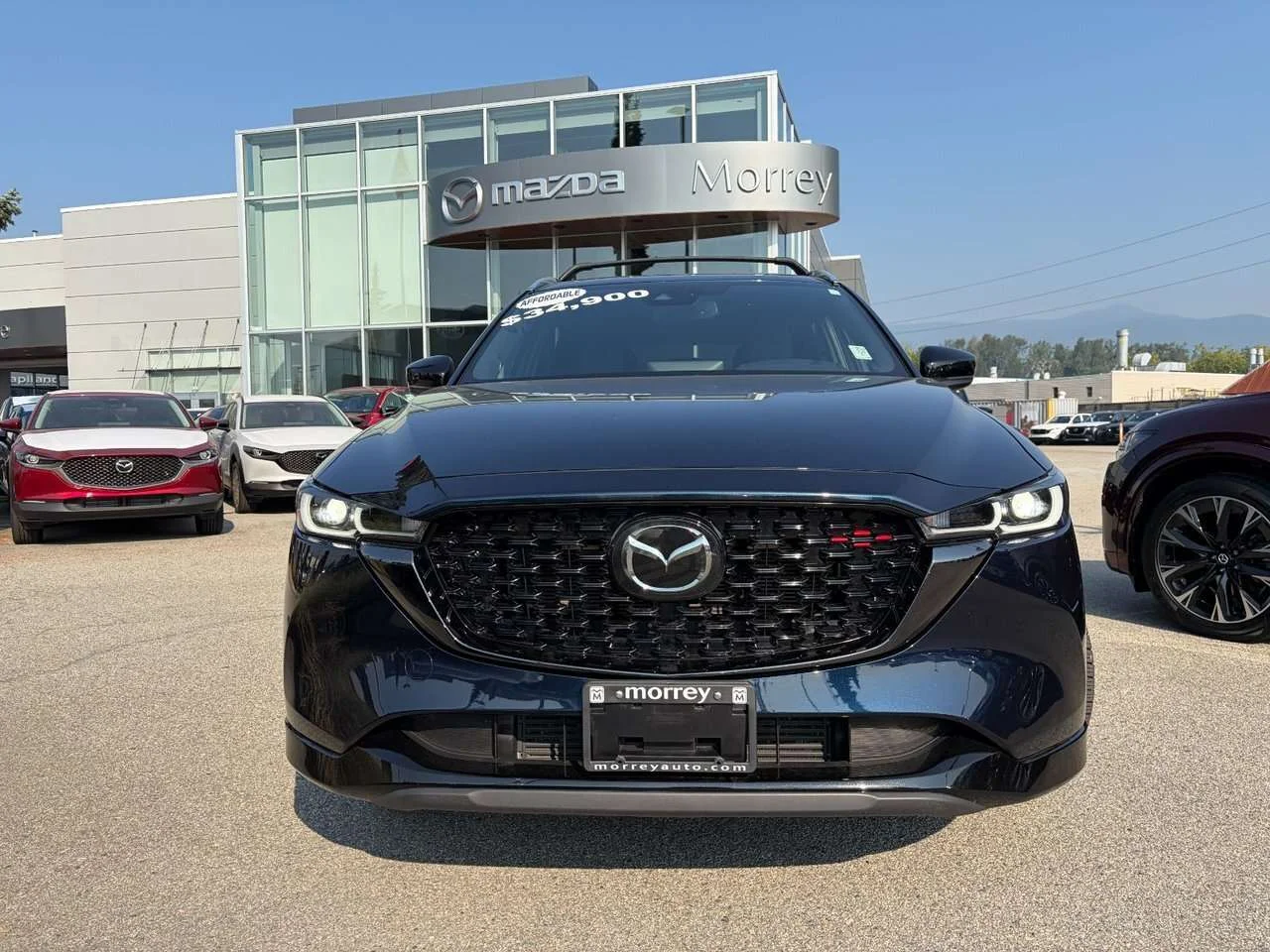 Used 2023 Deep Crystal Blue Mica Mazda Sport Design image 2
