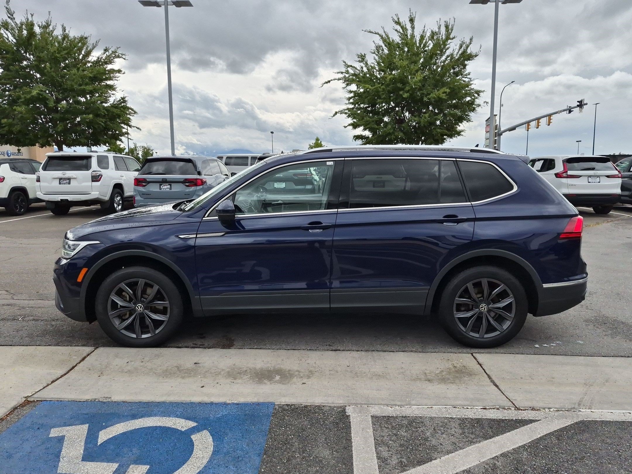 Used 2023 Atlantic Blue Metallic Volkswagen SE image 7