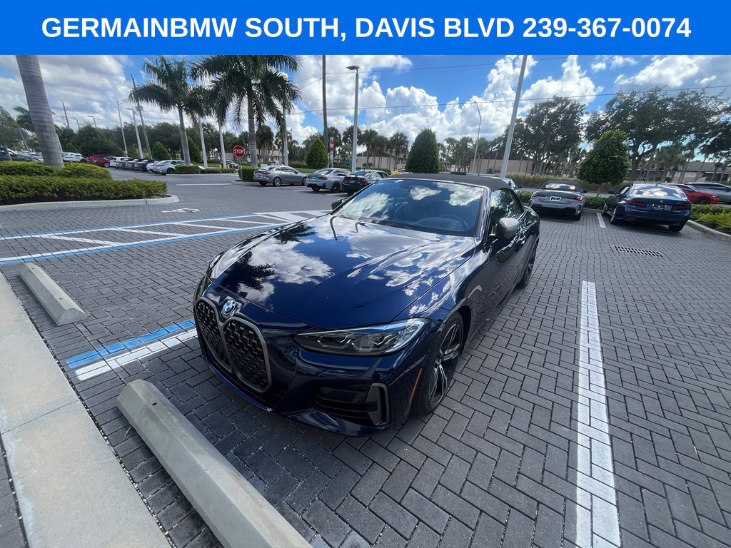Certified Used 2023 Tanzanite Blue II Metallic BMW M440i image 1