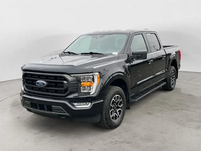 Certified Used 2023 Agate Black Metallic Ford XLT image 1