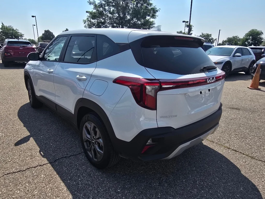 Used 2026 Snow White Pearl Kia LX image 3
