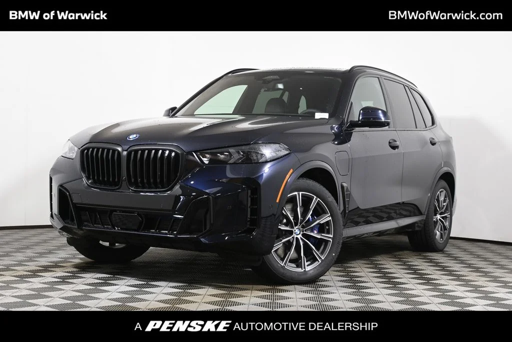 Used 2026 Black BMW xDrive50e image 1
