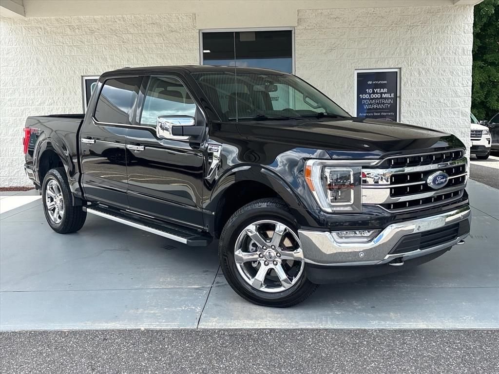 Used 2023 Black Metallic Ford Lariat image 1