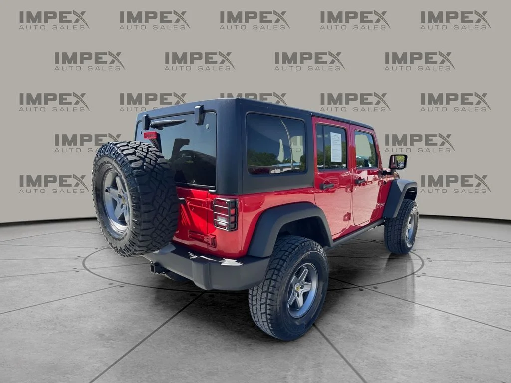 Used 2012 Red Jeep Unlimited Rubicon image 5