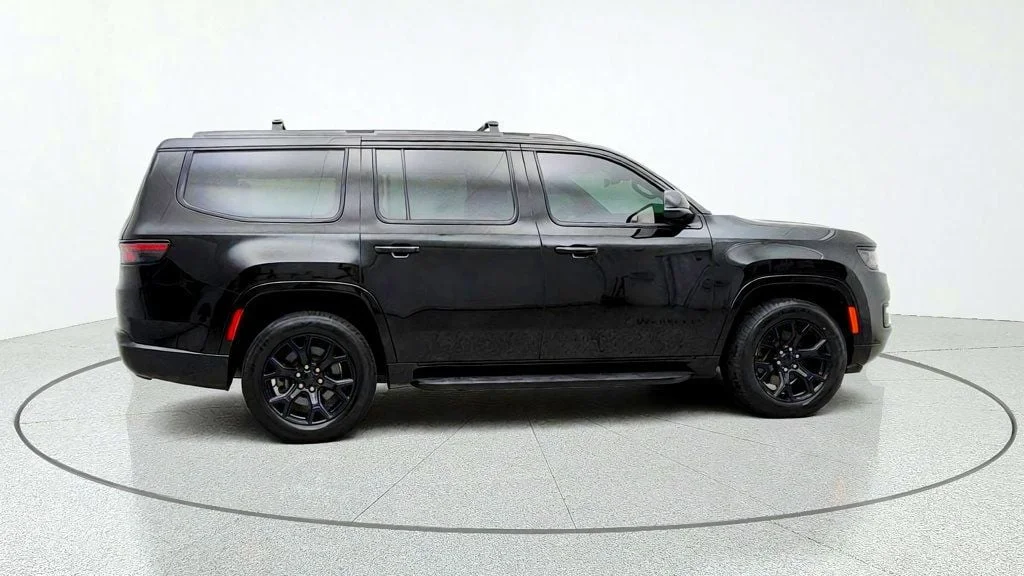Used 2023 Diamond Black Crystal Pearlcoat Jeep Series II Carbide 4x4 w/ Tri-Pane Roof & Captain