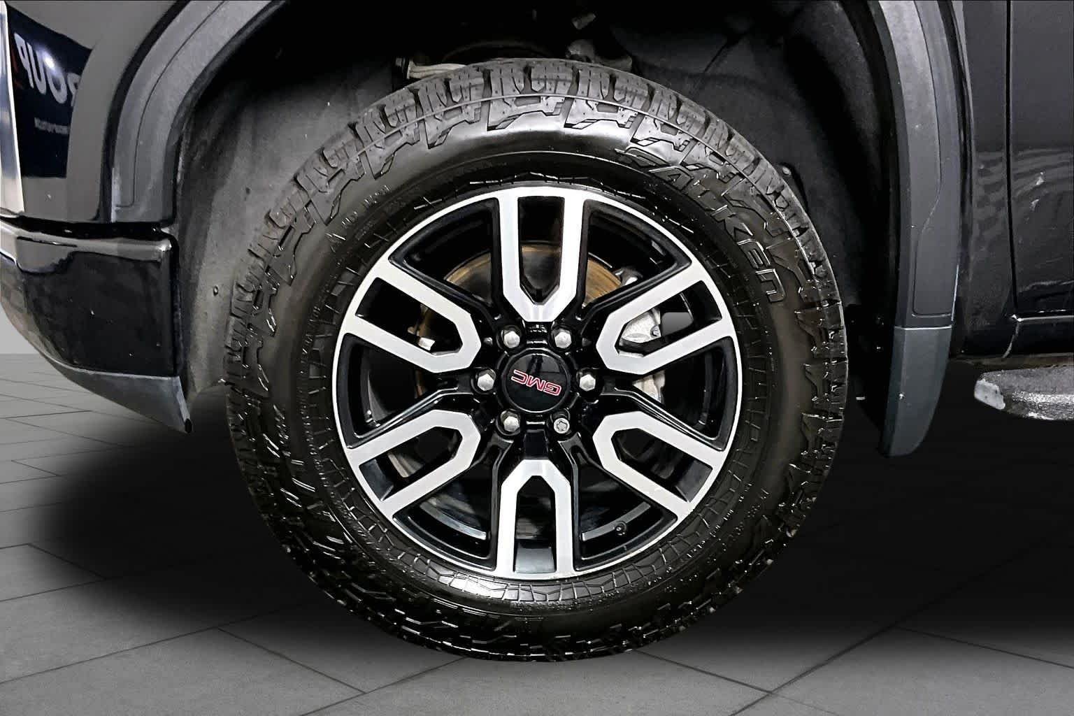 Used 2021 EBONY TWILIGHT METALLIC GMC AT4 image 11