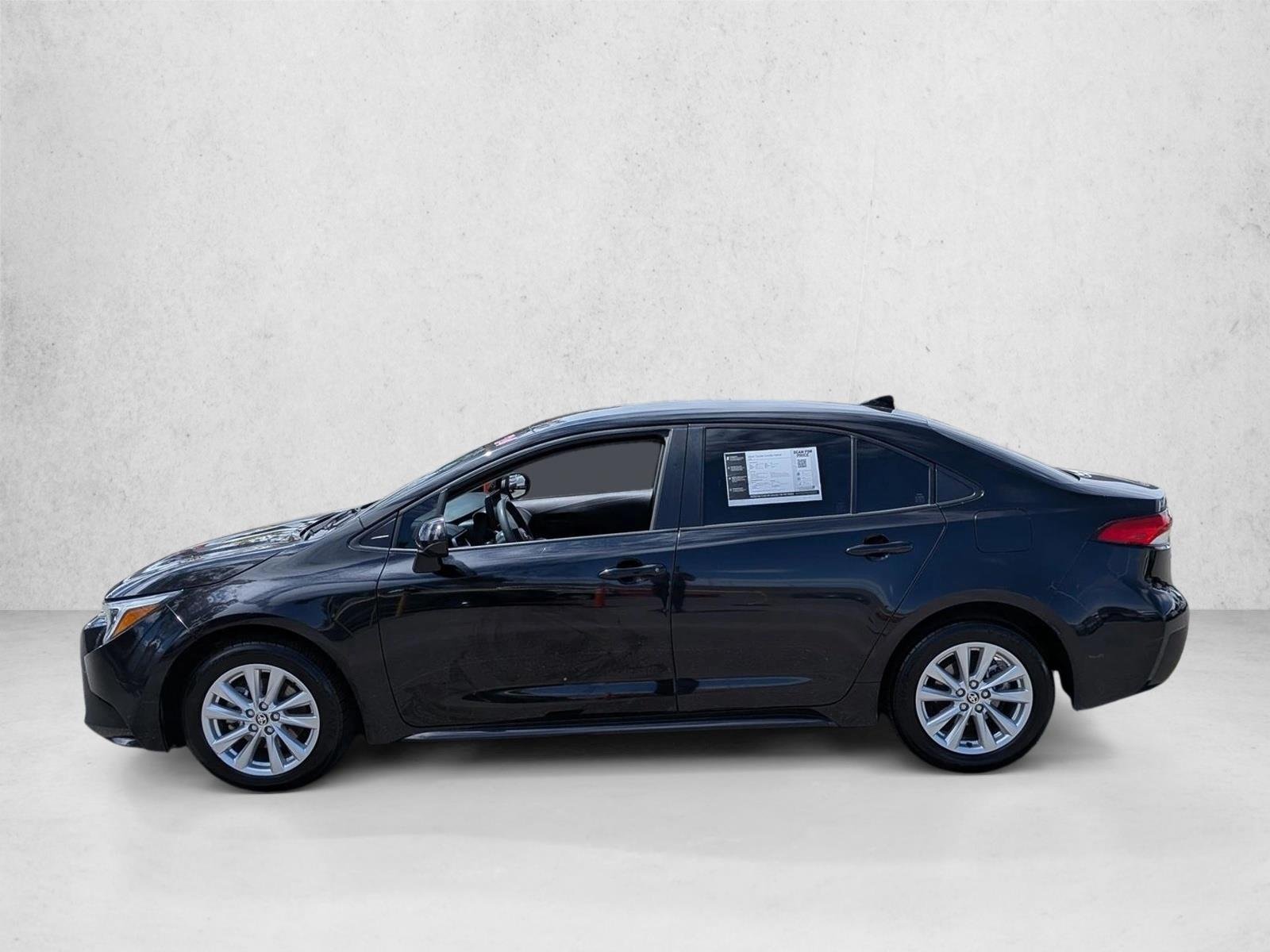 Used 2024 Midnight Black Metallic Toyota Hybrid LE image 9