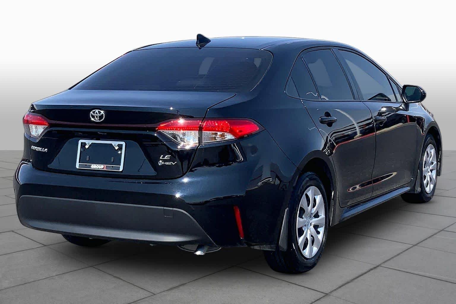 Used 2026 Midnight Black Metallic Toyota Hybrid LE image 13