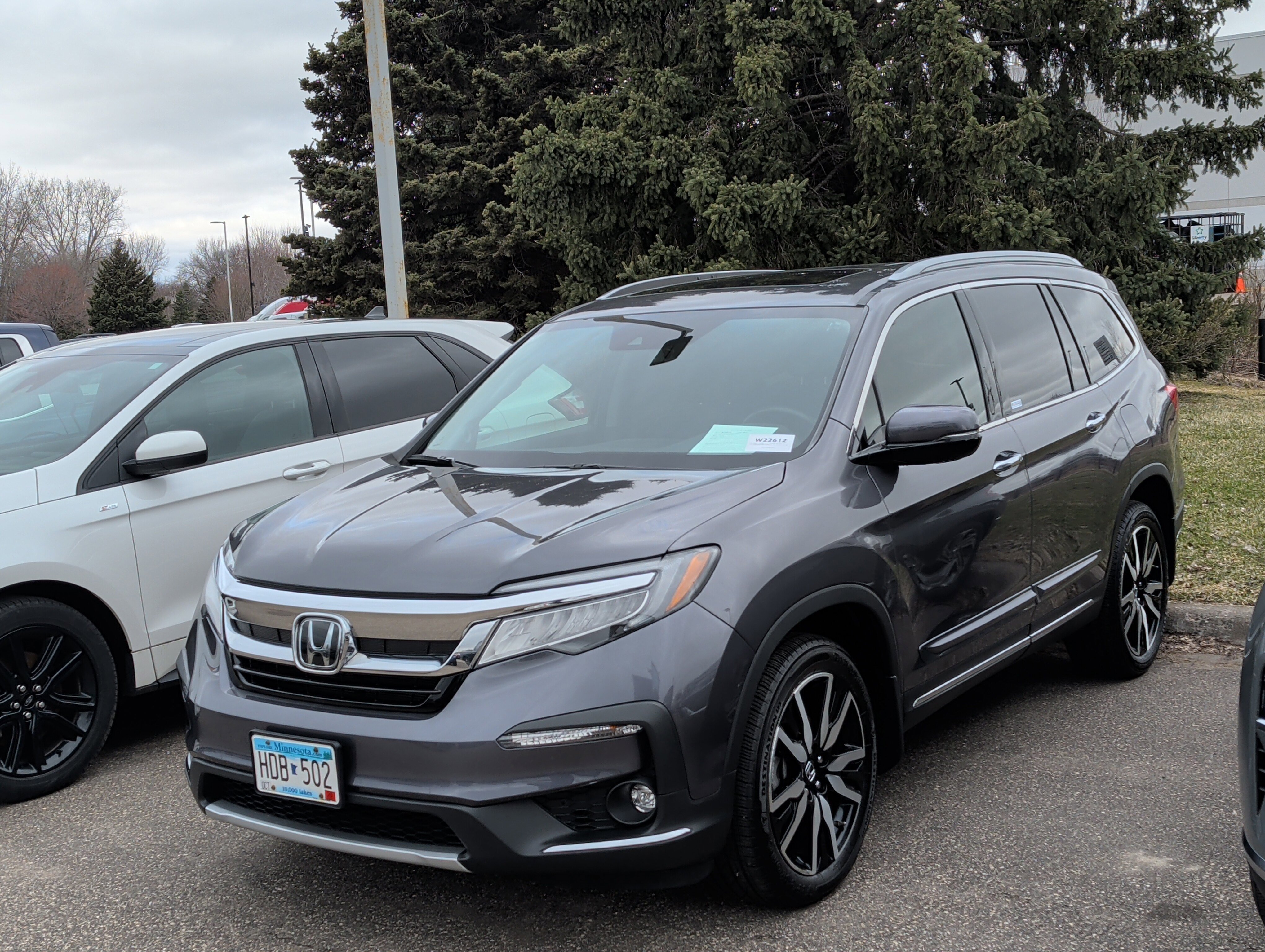 Certified 2022 Honda Pilot Touring with VIN 5FNYF6H66NB014362 for sale in Coon Rapids, Minnesota