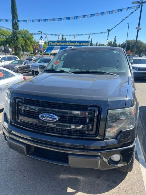 Used 2013 Black Ford FX2 image 2