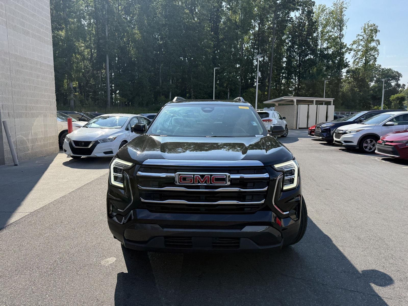 Used 2025 Ebony Twilight Metallic GMC AWD Elevation image 2