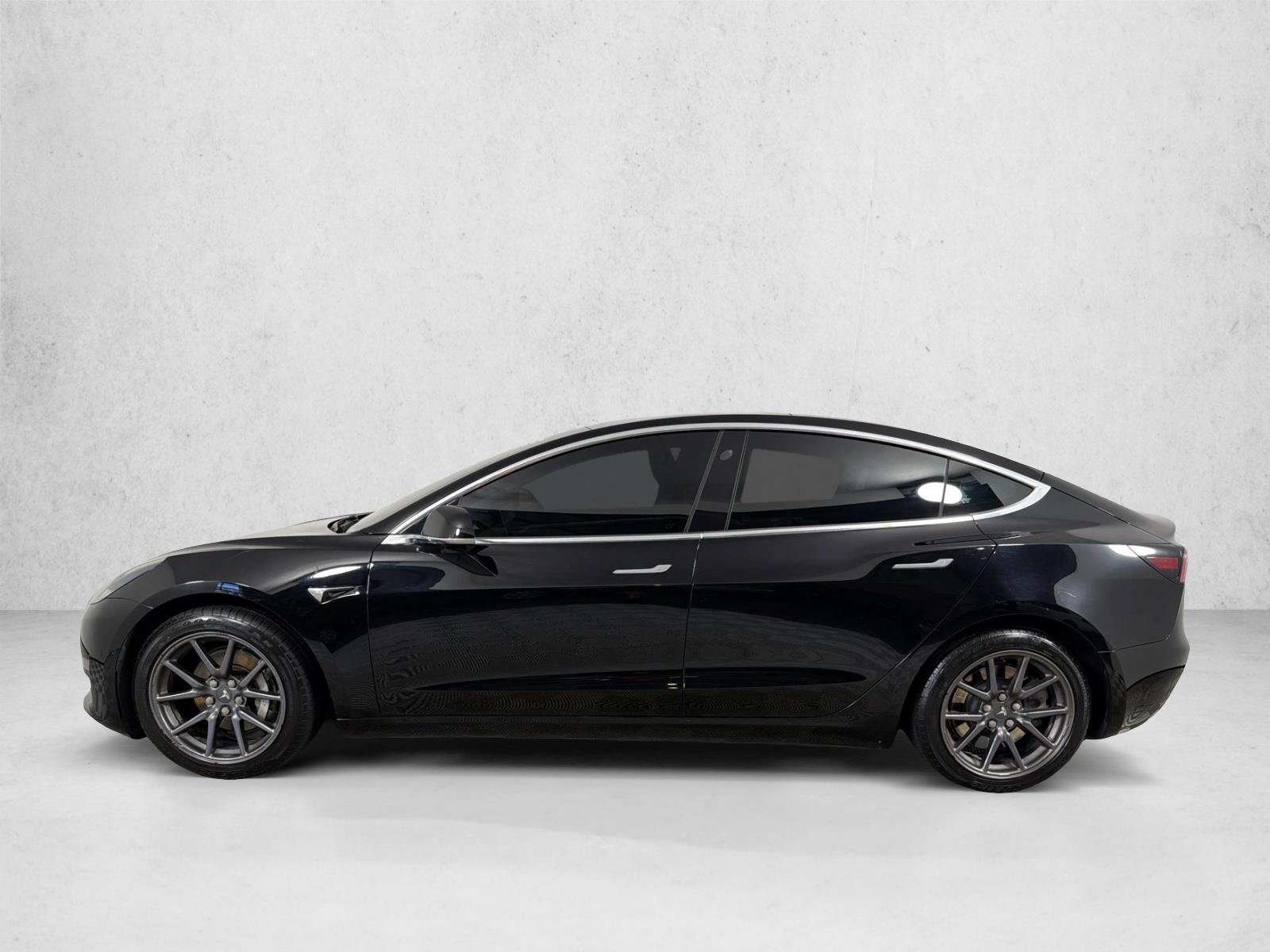 Used 2019 Solid Black Tesla Performance image 7