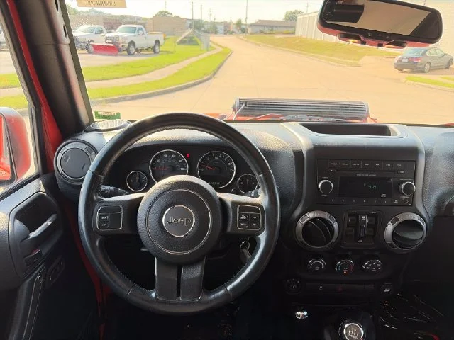 Used 2015 Orange Jeep Unlimited Sport image 25