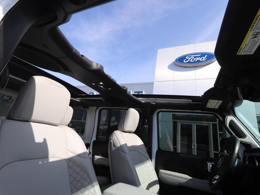 Certified 2023 Jeep Wrangler 4xe High Altitude 4XE with VIN 1C4JJXP6XPW569384 for sale in Seminole, FL