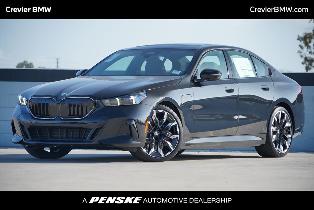 New 2027 Black Sapphire Metallic BMW 550e xDrive image 1