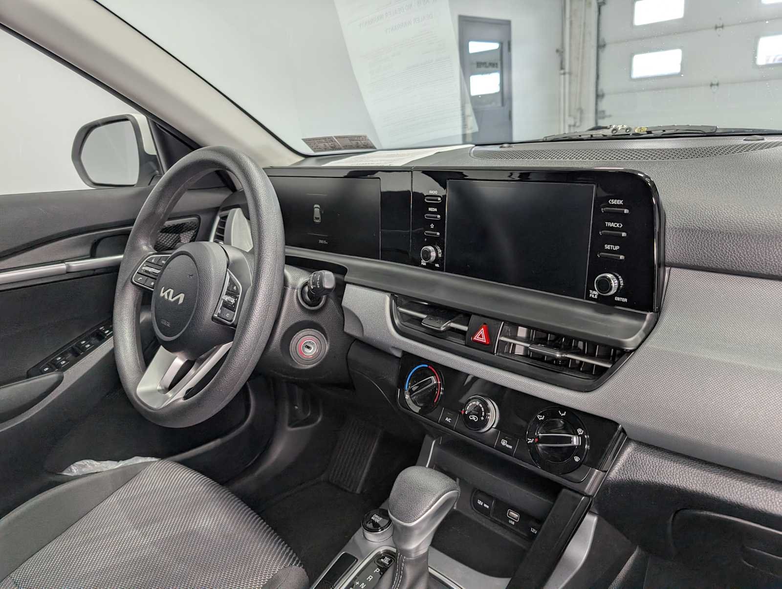 Used 2024 Snow White Pearl Kia LX image 39