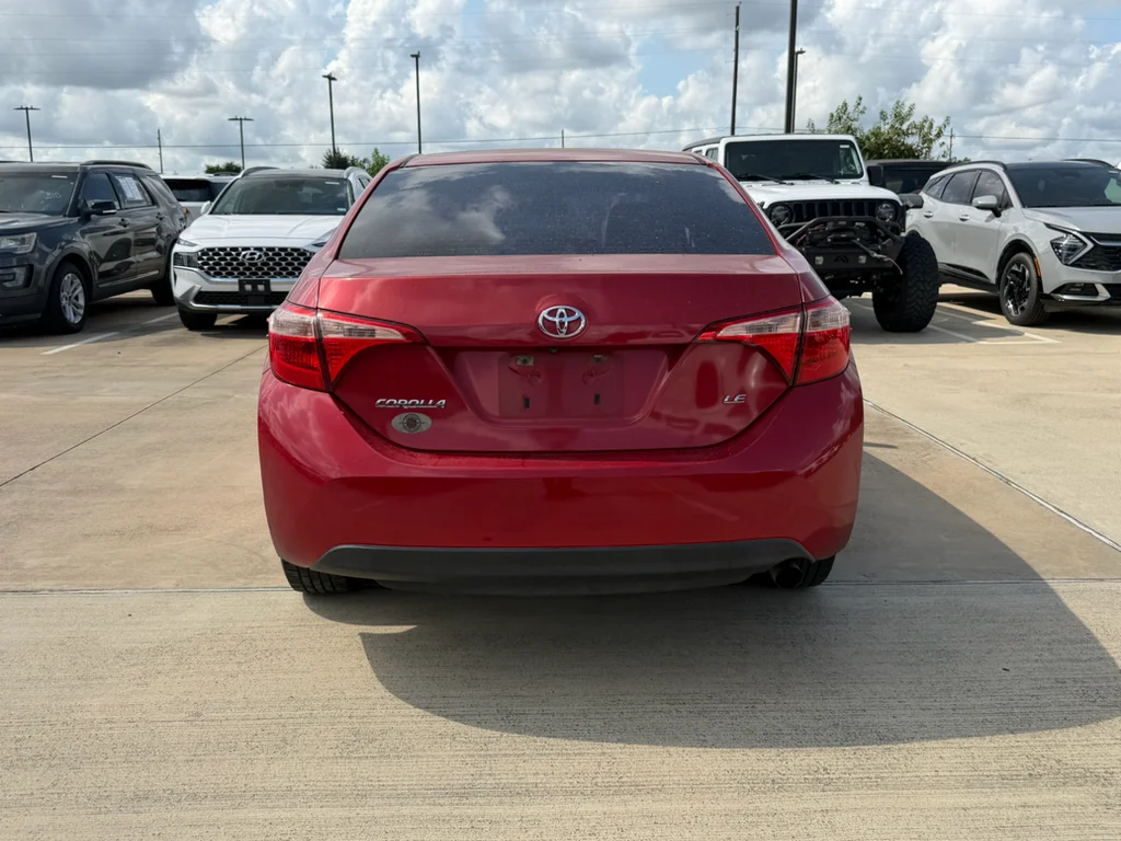 Used 2017 Barcelona Red Metallic Toyota LE image 5