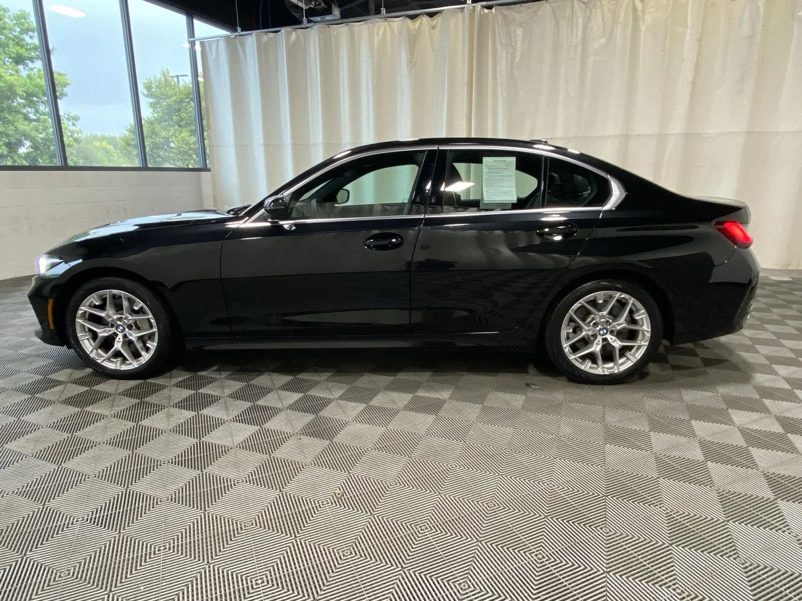 Used 2025 Black Sapphire Metallic BMW 330i xDrive image 9