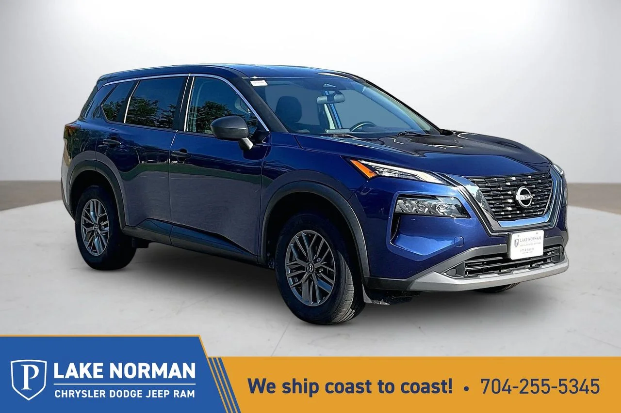Certified Used 2023 Blue Nissan S image 1